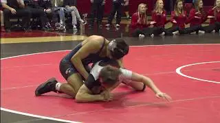 Higginbotham's Pin Fall Secures Victory for Edmond North