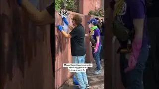 Mayor of L.A. Karen Bass is spotted removing protest graffiti in downtown L.A.