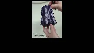 Carving of our purple pillar candle!
