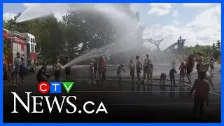 Firefighters create spray park for Alberta kids
