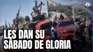 Narcodesfile en Michoacán: Gente moja y celebra paso de sicarios del CJNG