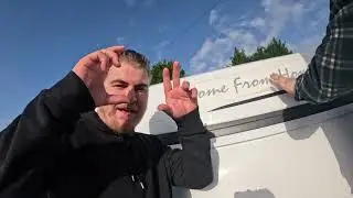 Doing ￼￼ the stickers on my camper van ￼