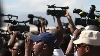 Thousands Greet Former President Jean-Bertrand Aristide as he returns from Exile