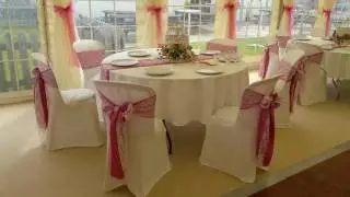 Wedding Chair Covers at the Marquee Wedding Lace and Pink Satin Market Rasen