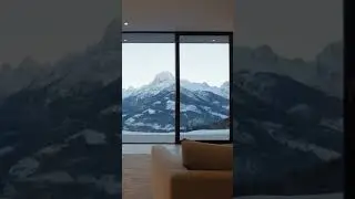 Minimalist luxury villa interior with floor-to-ceiling windows overlooking snow-capped mountains