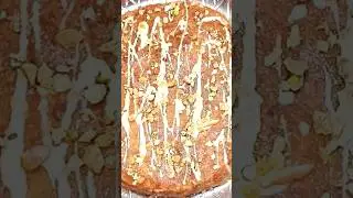 Dates cake topped with tahini & nuts | كيك التمر مزيّن بالطحينة والمكسرات والزبيب