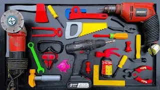 Collection of Repair Tools, Electric Drill, Electric Saw, Hammer With Wriench, Pliers, Hacksaw