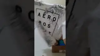 Camisas Aeropostale com o redirecionamento da Shipito