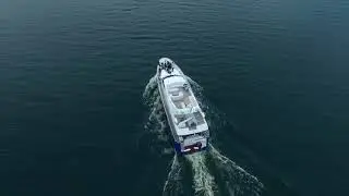 aerial view of white yacht sailing on blue sea luxury motor boat