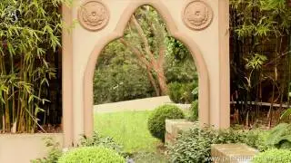 How to add interest to a terraced garden using garden mirrors.