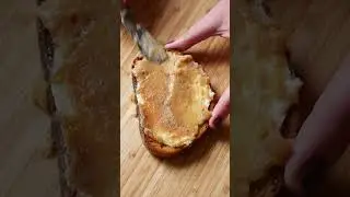 Garlic confit with laughing cow cheese on toast