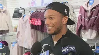 DJ Moore takes 10 Boys and Girls Club kids on a surprise Christmas shopping trip