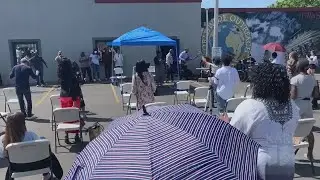 Large crowd attends service at 38th and Chicago Avenue