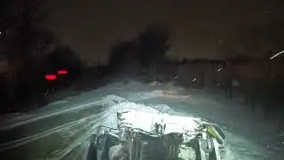 Nighttime plowing with AMI Reactor Snowblade on asphalt and gravel