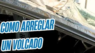 Herramientas para reparar un automóvil Chevrolet volcado