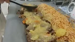 MACARRONADA AO MOLHO DE CARNE MOIDA E LARGARTO ASSADO 