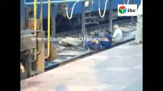 south indian railway sweepers waiting for cleaning