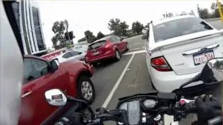 Undercover Traffic Enforcement Group officer pulling over people using mobile phones