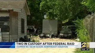 Two in custody after federal raid