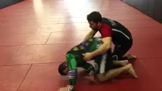 Wrestling spiral ride grip against turtle position in BJJ
