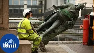 Statue of Robert Milligan is taken down outside Museum of London