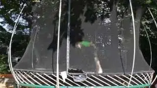 Young Boy Doing Epic Tricks On Tramp