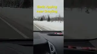 snowmobiles ripping through grayling