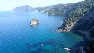 Paramotor flight, over the islet of Kyrathikaia, off the island of Corfu.