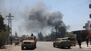 Fighters clash in southern Syria
