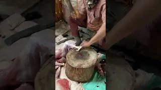 Goat leg cutting.