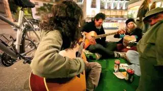 Occupy Zurich Paradeplatz Night Oct 15th 2011 -- Warming Up Song &raquo;Long Train Running&laquo;
