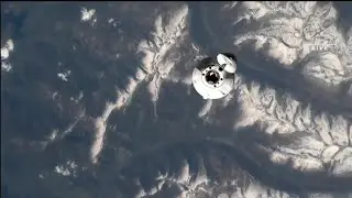 SpaceX cargo craft docks with space station