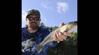 Busch Mountain Fishing Guide Service hauling in Trout.