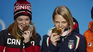 Canadian Olympic speedskaters celebrate their numerous medals