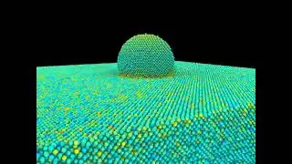 Atomistic modeling of laser assisted cold spray deposition