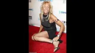 Tan Mom Patricia Krentcil is a red carpet disaster as she falls over Howard Stern's 60th