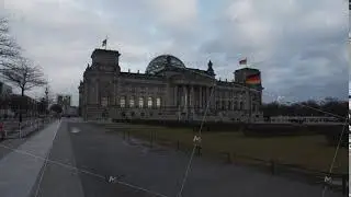 SLOW MOTION: Bundestag, Reichstag Roof from distamce in Berlin, Germany on cloudy day