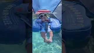 Sun-Safe Splashing: MamboBaby Float with Built-In Canopy!