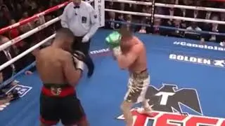 Canelo takes a huge shot from Jacobs like a BOSS
