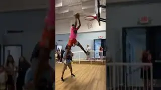 AMAZING Dunk over 2 people!