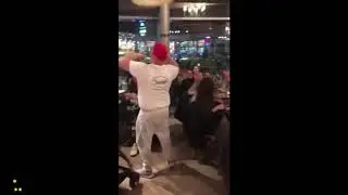 Chef In Restaurant Shows Off His Pizza Dough Flipping Skills