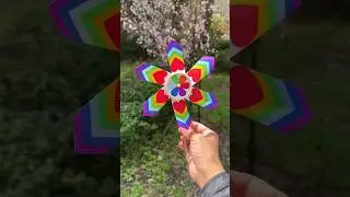 Spring is here, use disposable paper cups to make a beautiful rainbow pinwheel for your @DIY_911