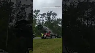 Car goes flying after crashing into tow truck