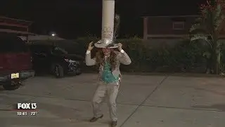 Tampa artist claims world's tallest hat