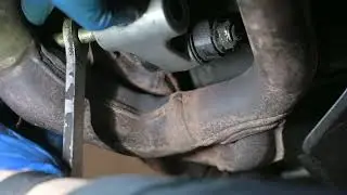 Remove SV1000S bottom dogbone (cushion lever) bolt without removing the exhaust.