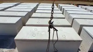 Loading up concrete boxes for delivery...