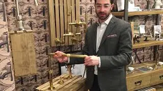 The Telescoping Brass Faucet That Solves Counter Space Without Looking Modern