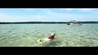 Swimming in the warm lake water #usa #swimming #kids #kidsswimmingvideos #michigan