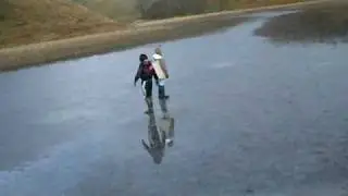 caitlin + steph on the frozen loch.. and caitlin... falling in ! :L