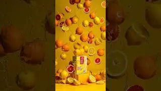 A hyper-realistic advertising photo of MINTIA BREEZE Fresh Lemon package standing at the center. ...